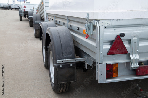 Fotografie Car open trailer.Sale and rental of car trailers.