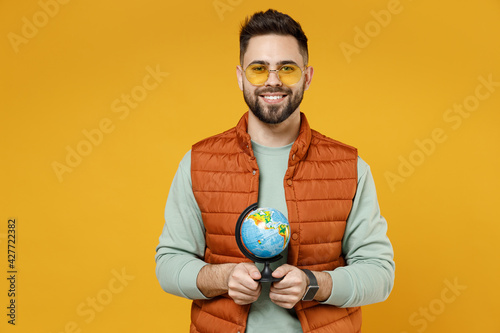 Fototapet Young smiling happy geography student teacher fun caucasian man 20s wearing oran