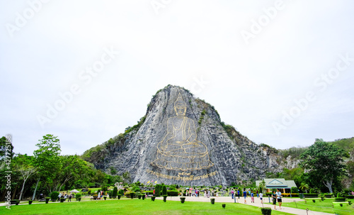 The Buddha Mountain (Khao Chi Chan), Thailand. A large image of the Buddha on the mountain. photo