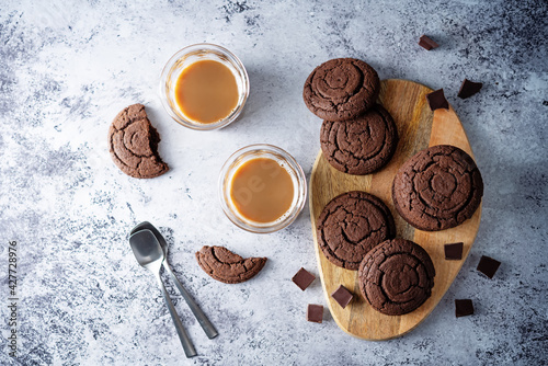 Chocolate cookies with chocolate slices photo