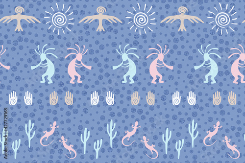 design with lizard, Kokopelli fertility deity, sun, eagle, cacti.