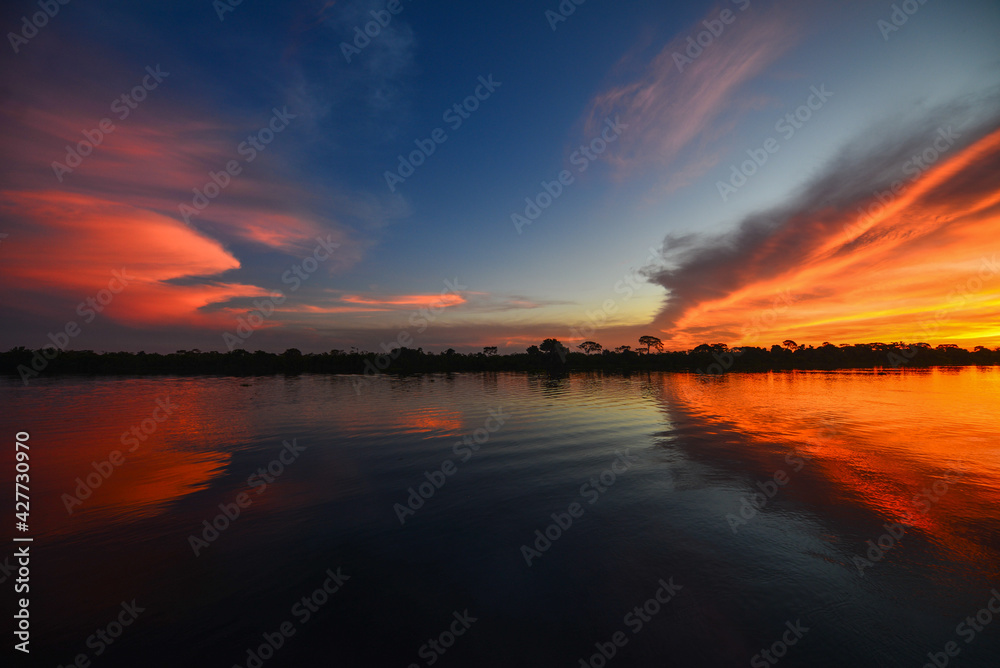 Obraz premium Beautiful sunset on the Guaporé-Itenez river, Ricardo Franco, Vale do Guaporé Indigenous Land, Rondônia, Brazil