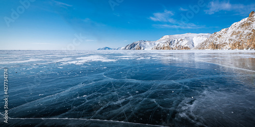 Transparent ice of Lake Baikal to the horizon