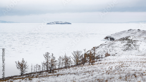 A small island in the ice of Lake Baikal photo