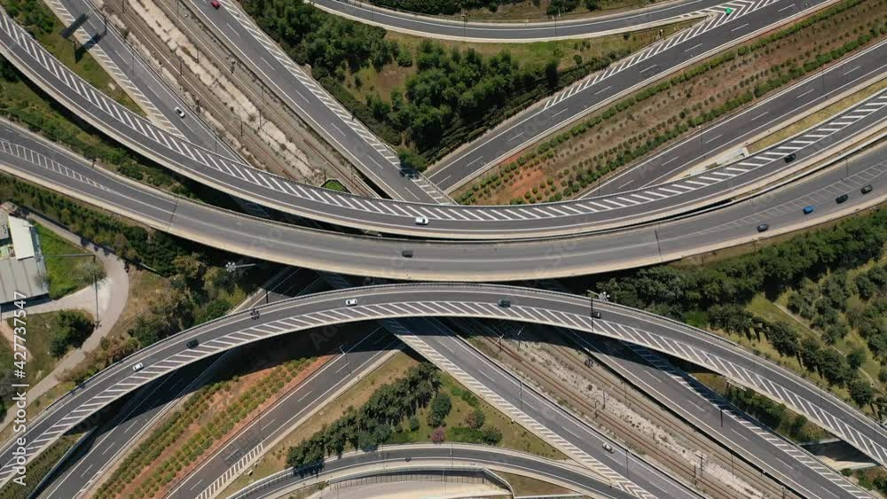 Aerial drone video of multilevel highway junction toll road of Attiki Odos connecting Attica to Athens International Airport of Eleftherios Venizelos, Attica, Greece Aerial drone video of multilevel highway junction toll road of Attiki Odos connecting Attica to Athens International Airport of Eleftherios Venizelos, Attica, Greece