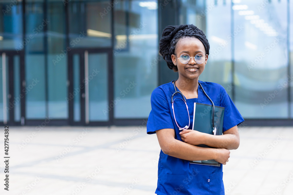 smart black girl medical student in glasses, happy young african
