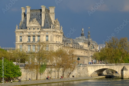 The Louvre Museum and the Seine river at the end of the day. Paris, France the 14th April 2021.