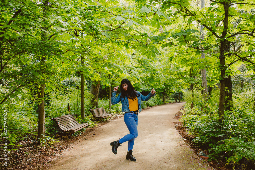 Fototapeta premium girl walks feeling happy nature moments