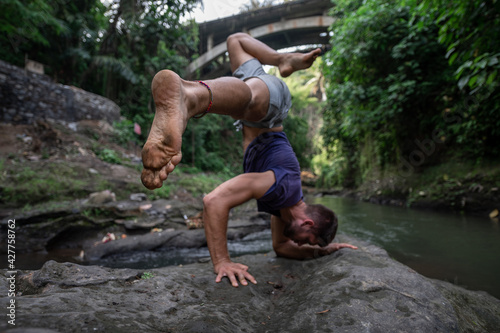 Man practice Yoga practice and meditation outdoor