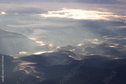 Mountain Tops reach into the Clouds © Sean