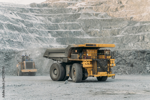 Komatsu 730e dump truck at a gold mining site.