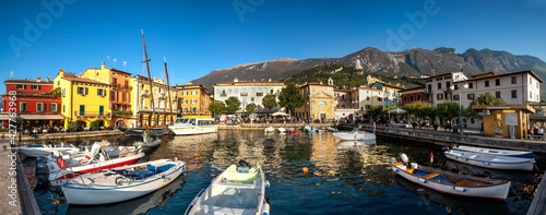 View of Malcesine at the lakeside of Lake Garda in summer in the northern Italy. Malcesine is a popular holiday location in Italy.