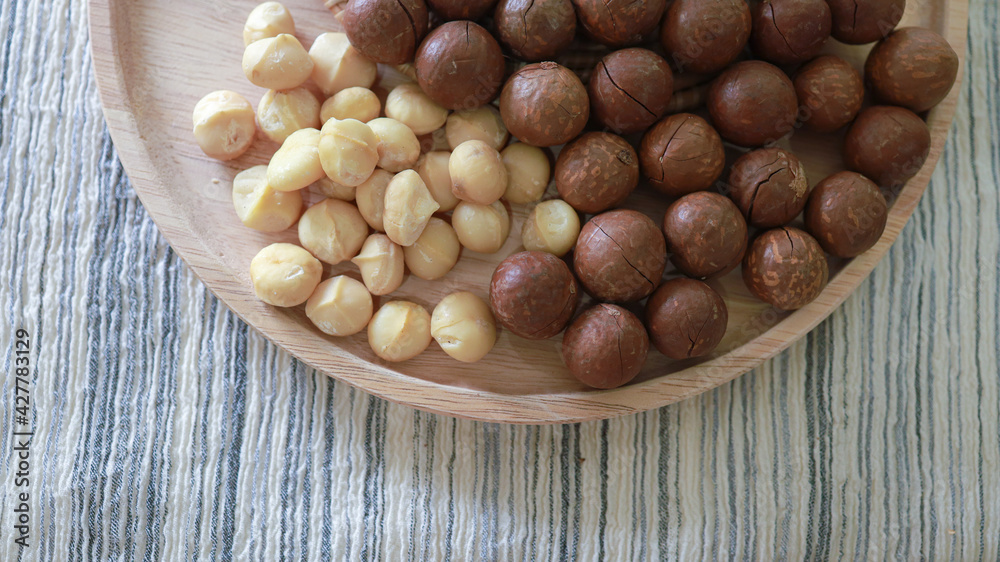 Organic Macadamia nut. macadamia nuts are cracked and baked to taste extremely delicious superfood fresh natural shelled unsalted raw macadamia and healthy food concept Organic Macadamia nut. macadamia nuts are cracked and baked to taste extremely delicious superfood fresh natural shelled unsalted raw macadamia and healthy food concept
