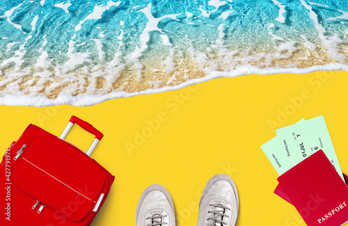 Travel banner, summer holidays, vacation concept, tourism: tropical island beach, blue sea wave, ocean water, sand, red suitcase, red passport, airplane boarding pass, flight ticket, gumshoes top view