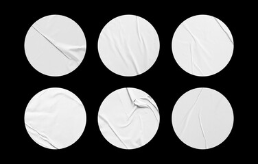 glued sticker mockup. round stickers set collection. realistic wrinkled surface of adhesive paper on black background. blank space for creative design.