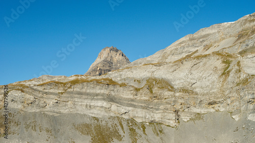 Fotografie, Obraz Low Angle View Of Rock Formations Against Clear Blue Sky
