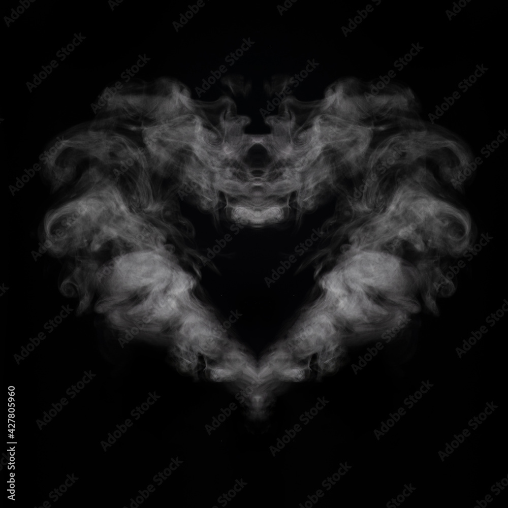 Steam or smoke in the shape of a mystical creature or in the shape of a heart on a black background, square frame