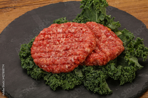 Raw beef burger cutlet for cooking