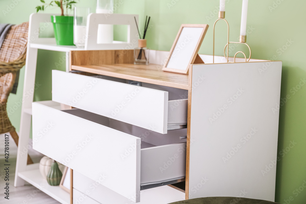 Modern chest of drawers in room, closeup Modern chest of drawers in room, closeup