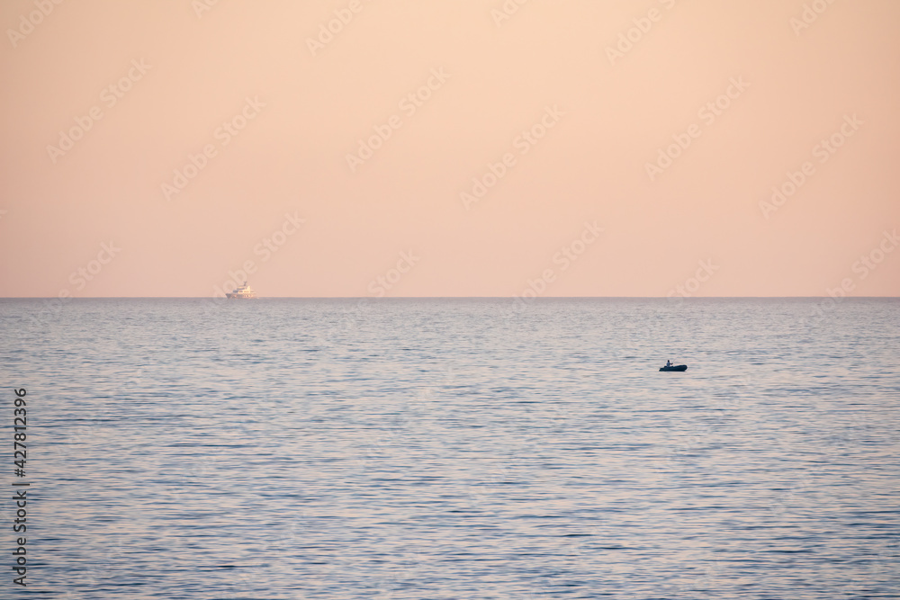 Obraz premium Beautiful pink sunset over the sea. Sochi, Russia