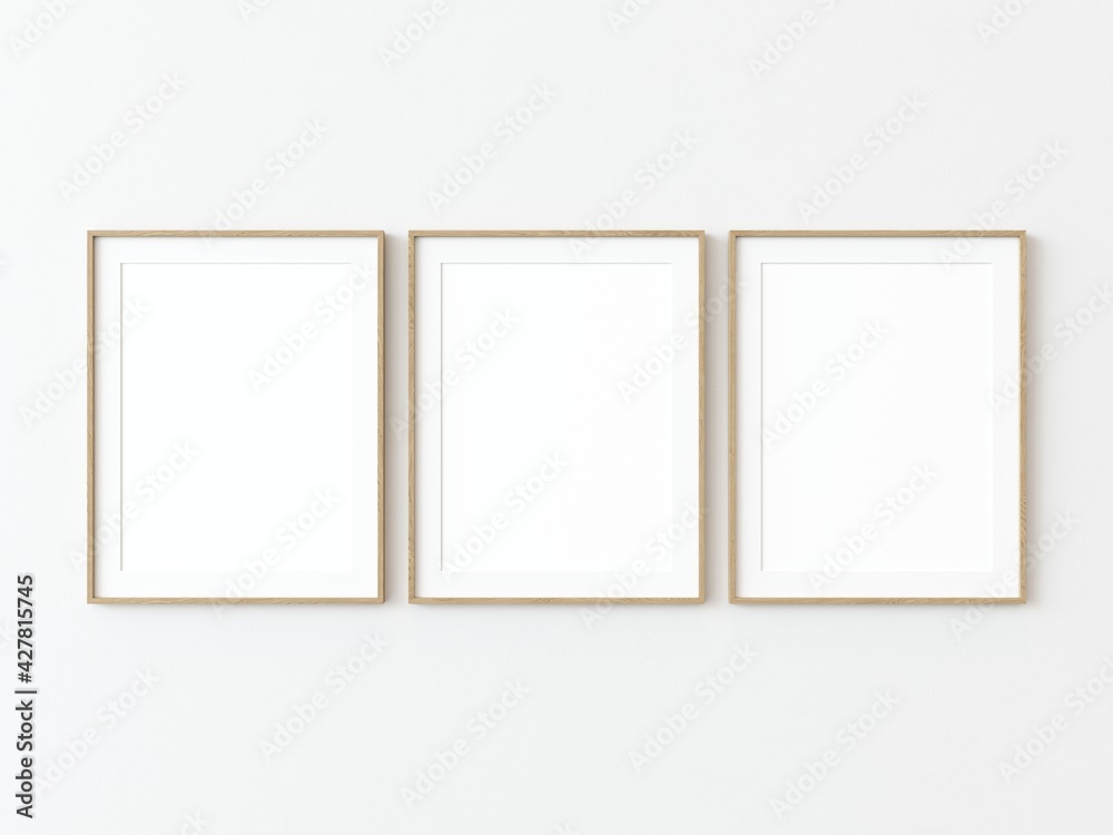 Three light wood thin rectangular vertical frame hanging on a white textured wall mockup, Flat lay, top view, 3D illustration