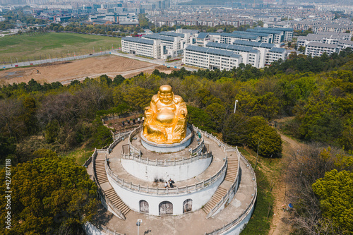 Aerial view of the golden big buddha in Shangfang Mountain in Suzhou, China photo