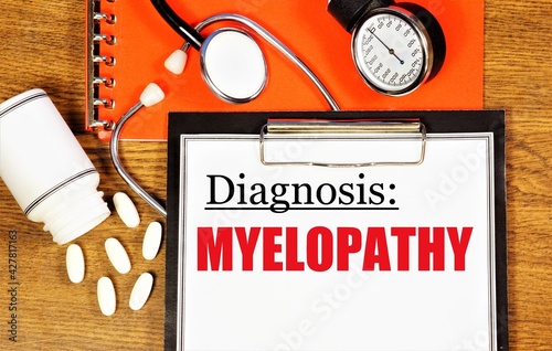 Myelopathy. Text label of the diagnosis on the medical folder. Prevention and treatment with medications and procedures. photo