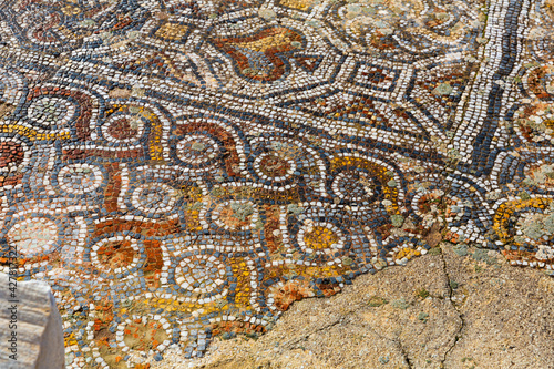 Closeup of patterns of ancient stone mosaic for floor facing in ruined houses of Ephesus, Izmir, Turkey