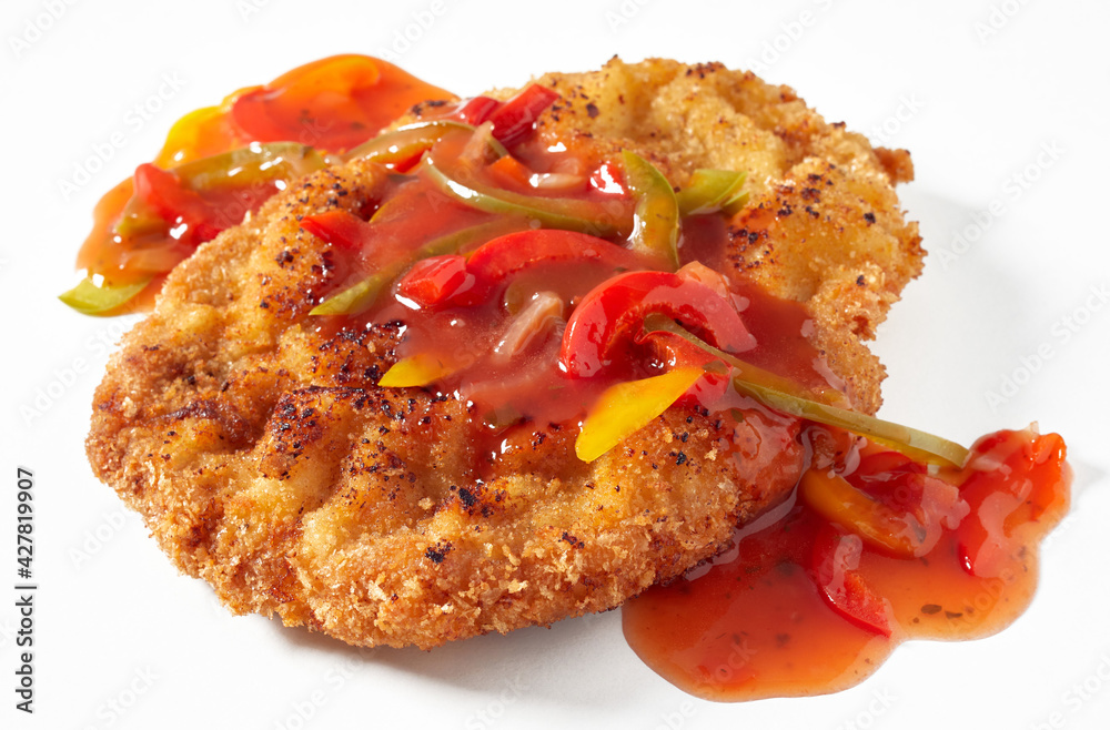 Tasty fried schnitzel with pepper sauce Tasty fried schnitzel with pepper sauce