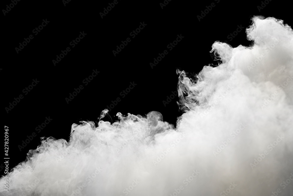 Smoke on a black background. Overlay. White clouds or fog. Graphic element
