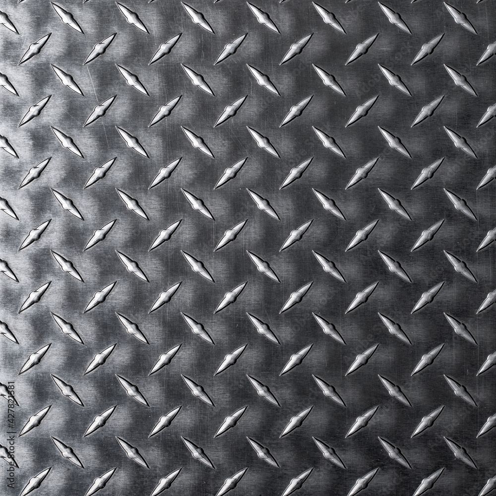 Abstract texture with rhombic pattern. Dark metal background. Abstract texture with rhombic pattern. Dark metal background.