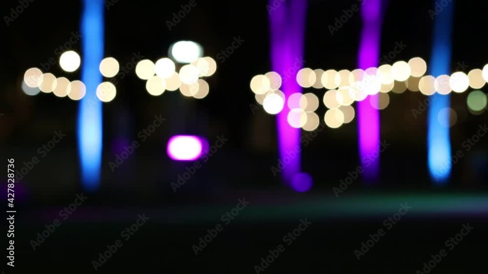 Abstract Defocus Person Walking In Front Of Festival Stage Lighting Abstract Defocus Person Walking In Front Of Festival Stage Lighting