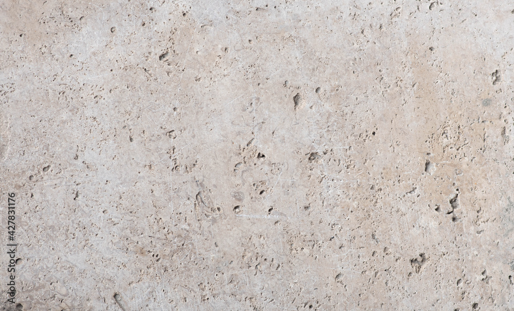beige concrete wall background with texture and scuffs beige concrete wall background with texture and scuffs