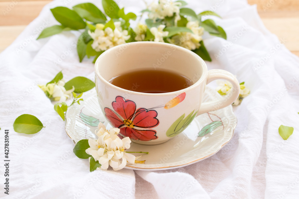 herbal healthy drinks ginger for health care with flowers arrangement flat lay style on background white wooden herbal healthy drinks ginger for health care with flowers arrangement flat lay style on background white wooden
