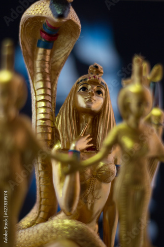 Egyptian figures snake, cleopatra and nebtht, eset
