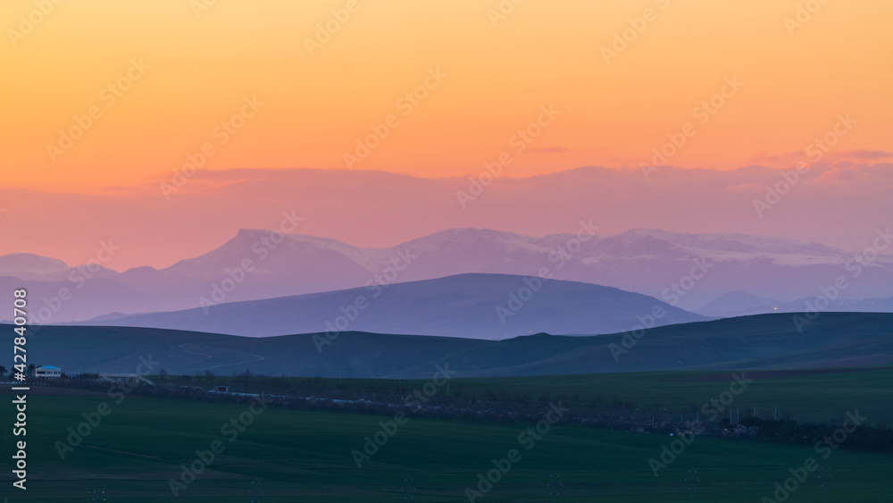 Mountain layers at sunset landscape