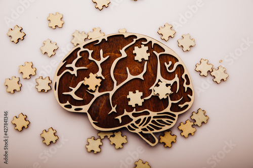 Brain with wooden puzzles. Mental Health and problems with memory photo