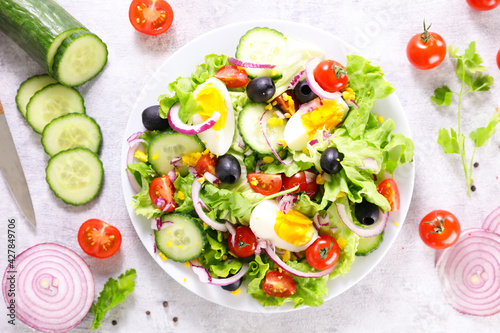 vegetable salad with egg, cucumber and tomato