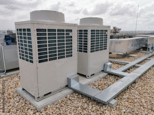 View of exterior VRV air conditioning units, extraction and insufflation, HVAC system, on the building roof