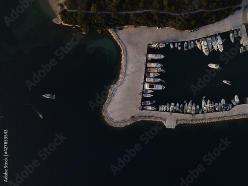 Aerial view of yachts, marina and seafront of famous sivota town in epirus, greece photo