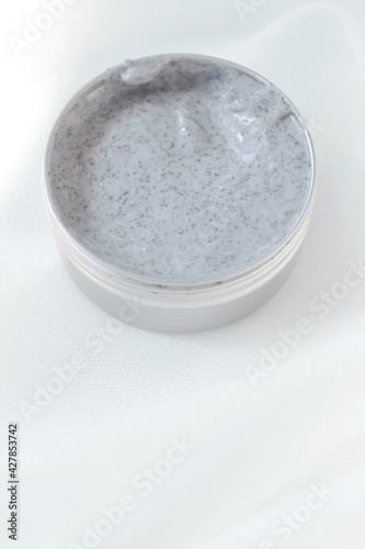 Organic skin care cosmetic concept. Natural scrub on a light background.