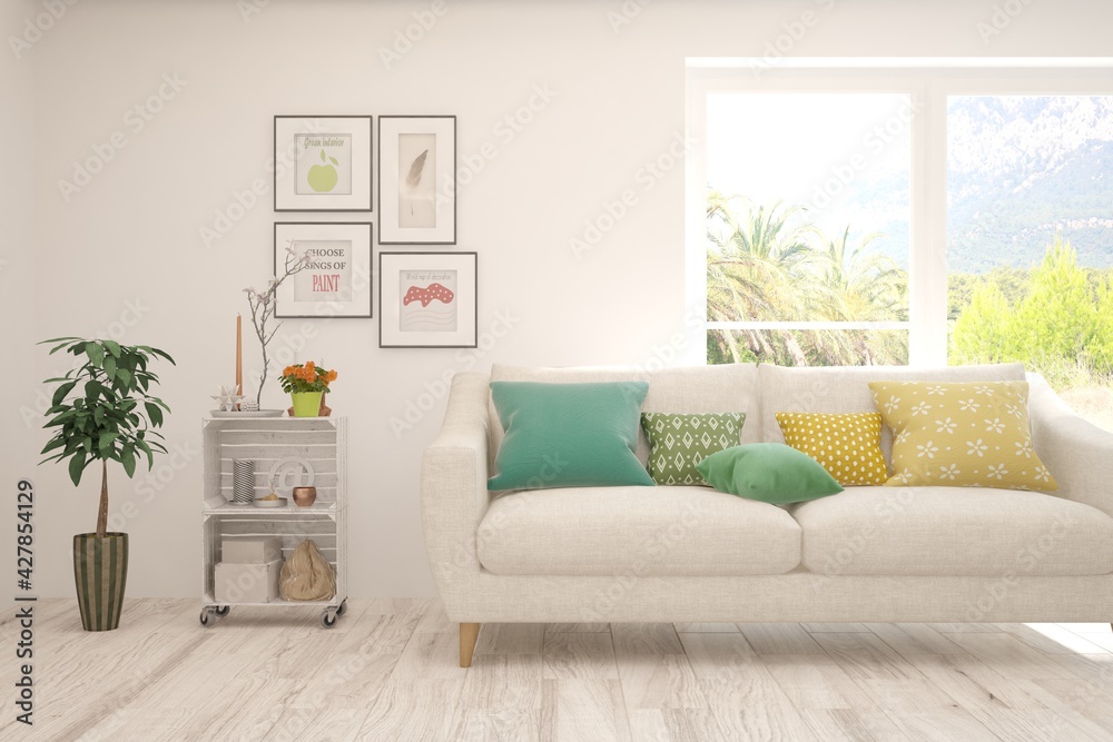 Fototapeta premium White living room with sofa and summer landscape in window. Scandinavian interior design. 3D illustration