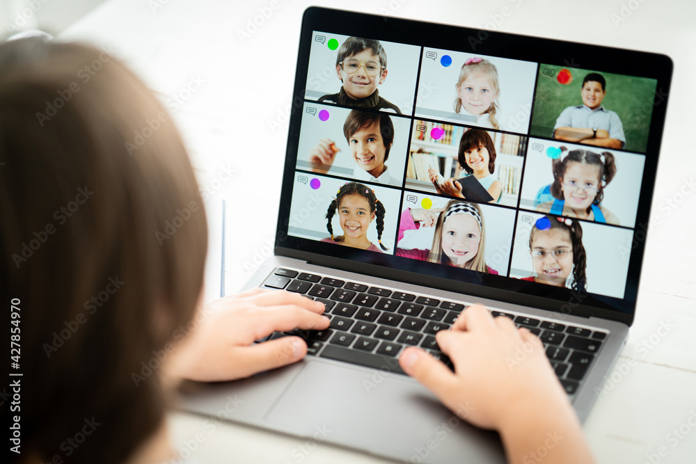 Little boy having online school distance learning class Little boy having online school distance learning class