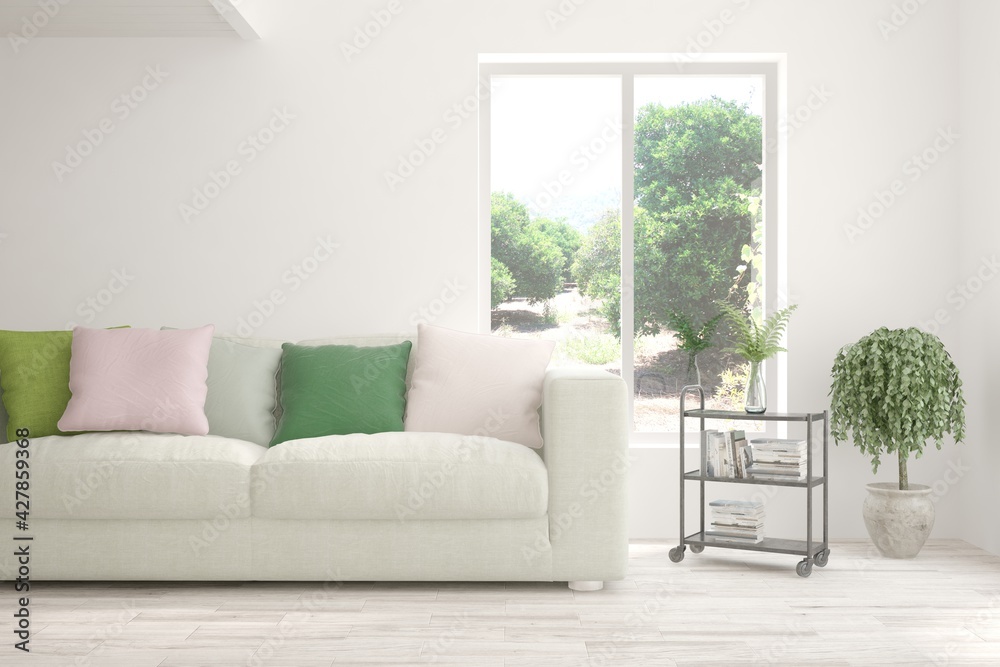 Obraz premium White living room with sofa and summer landscape in window. Scandinavian interior design. 3D illustration