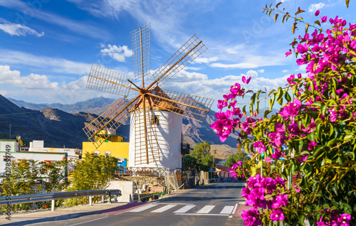 Lanscape with traditional old windmill in Mogan village, Gran Canary, Spain