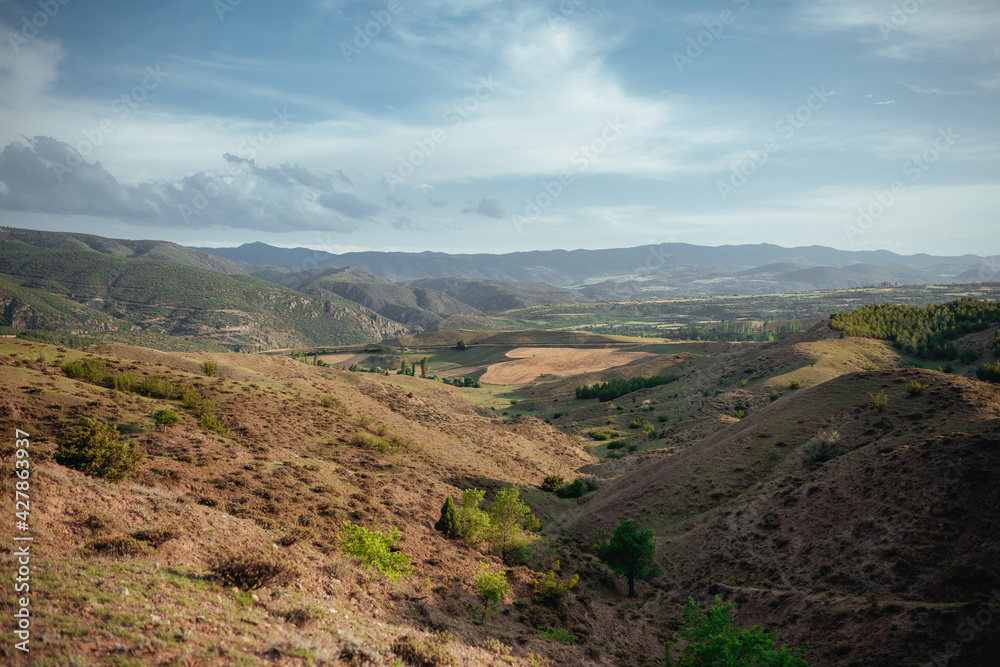 A large plain, mountains and spike fields in Anatolia