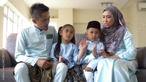 Eid Mubarak celebration moment, Malay family photo