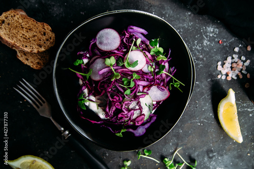 Purple cabbage salad with radish and cucumber