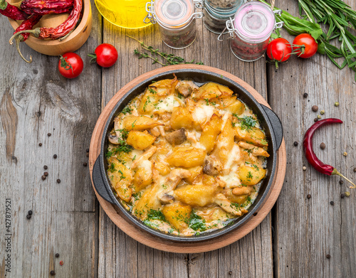 Tyrolean fried potatoes with meat, bacon and mushrooms, Tyrolean Groestl photo