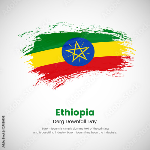 Brush painted grunge flag of Ethiopia country. Derg Downfall Day of Ethiopia. Abstract creative painted grunge brush flag background.
